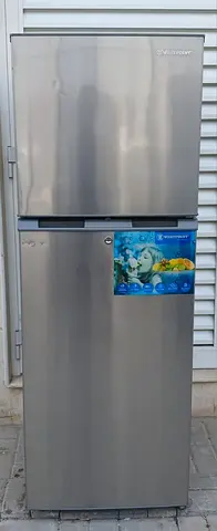 Double door Westpoint Refrigerator, light grey color, condition is working perfect.