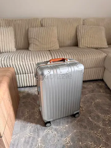 Rimowa stylish red handel cabin luggage