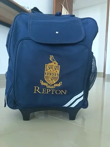 Repton navy rolling school backpack with wheels - great condition - Unused