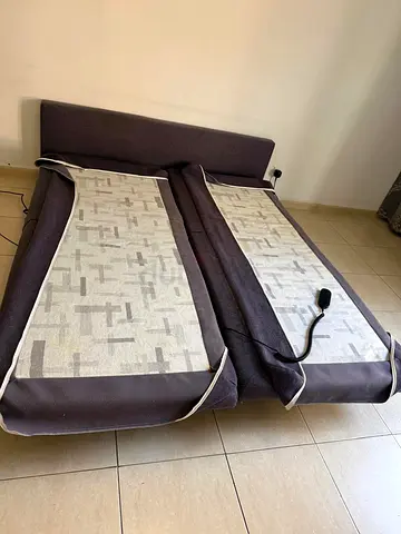 Pair of adjustable electric single beds with headboards - good condition