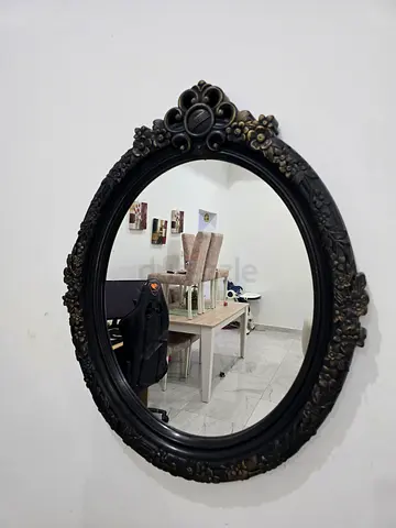 Ornate Vintage-Style Oval Wall Mirror with Dark Floral Frame