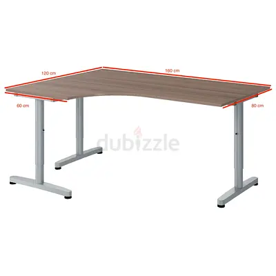IKEA L-shaped adjustable height office desk - brown wood top only.