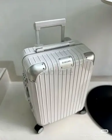 Rimowa hybrid cabin in gloss white suitcase