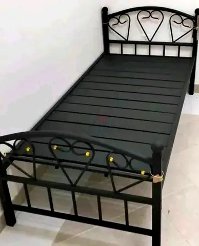 Two single Metal Bed frames for sale in Karama