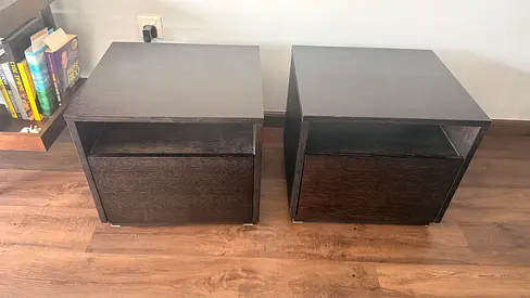 Pair of dark wood bedside tables with storage drawers