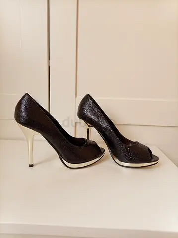 Black peep-toe high heels with metallic stiletto, size 37, excellent condition, worn once