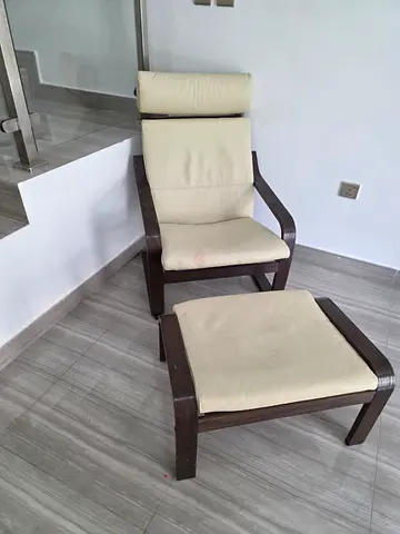 Wooden lounge chair with ottoman - cream cushions, good condition