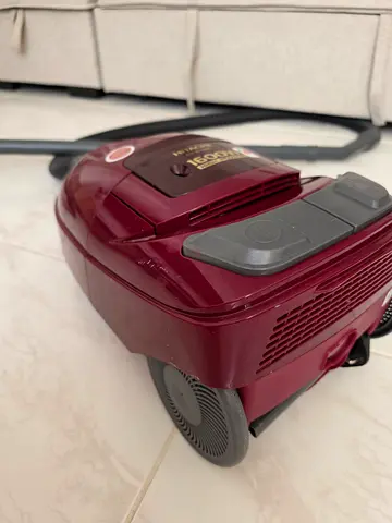 Used canister vacuum cleaner, compact and working