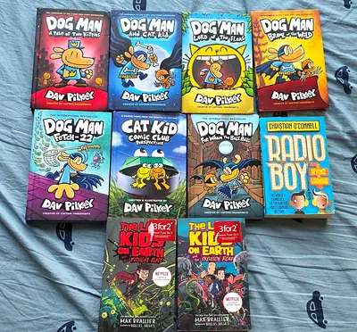 Box of kids graphic novels: Dog Man series