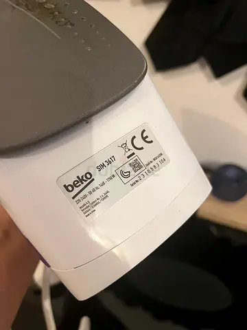 Used steam iron - purple/white, good working condition
