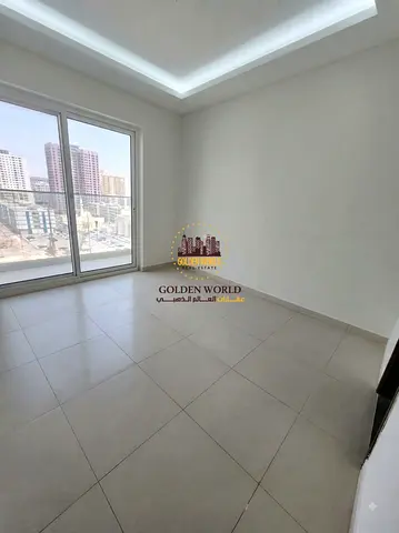 2BR apartment for annual rent in Al Taawun, Sharjah – AED 58,000. Second tenant, 2 master bedrooms, 3 bathrooms, balcony, central AC & free parking.