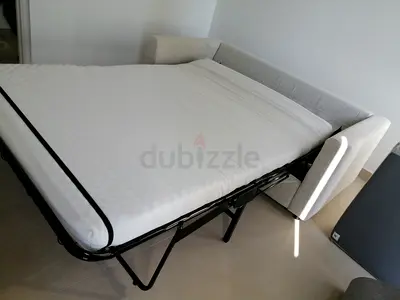 Comfortable fold-out sofa bed with mattress - good condition