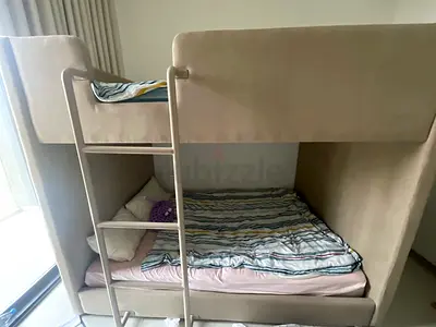Modern luxurious material upholstered bunk bed with ladder — good condition