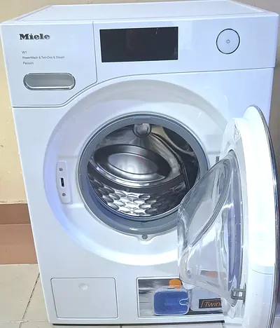 Miele WWV980 WPS Passion is a high-end 9 kg front-load washing machine featuring a 1600 rpm spin sp