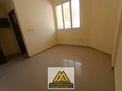 Studio on the ground floor in Al Bustan 2, semi-separate kitchen, central AC, free maintenance, AED