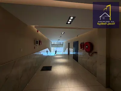 Building for sale in Al Qasimia area, Sharjah, corner lot on two streets, prime location