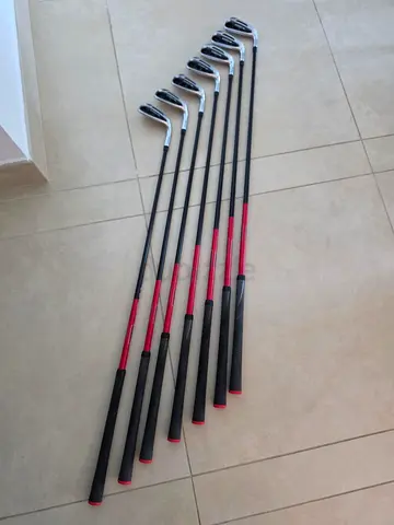 Golf clubs - iron set - cobra - graphite shaft