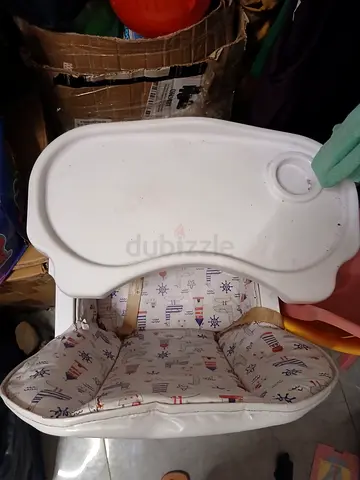 Used baby high chair with removable tray and padded seat