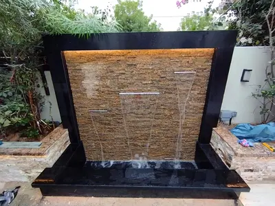 Modern Outdoor Water Feature with Built-in Lighting