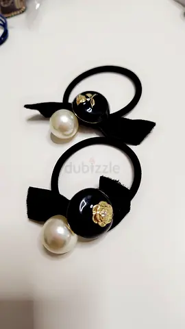 Pair of black bow hair ties with pearl & gold floral accents