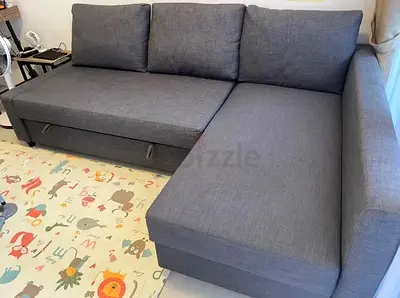 Grey L-shaped Sofa with Storage - Good Condition