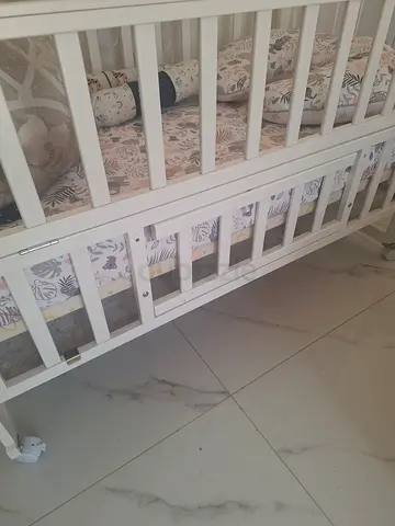 Adjustable White Wooden Baby Crib