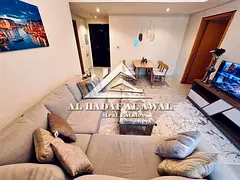 One bedroom and living room in Al Taawun Tower, Hafeet 2, with a balcony, good size, two bathrooms. 