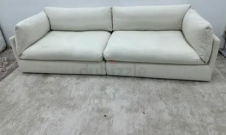 Looks great condition the loom collection three seater sofa