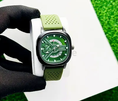 Casio green dial men's wristwatch with green silicone strap - good condition