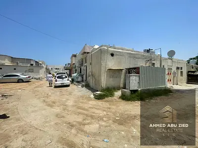 Corner Arabic-Style House for Sale in Al Rashidiya 3, Ajman, 2,400 Sq. Ft., 5 Bedrooms, 2 Living Rooms, AED 50K Annual Income, AED 720K Negotiable
