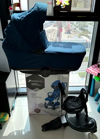 Leclerc stroller, bassinet and wheeled board