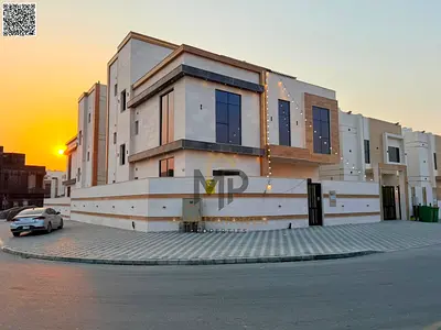 Corner Villa for sale | ajman| al helio2 area | 7 master rooms, majlis, hall, maid room, roof| free