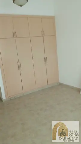 Two bedrooms and a living room for annual rent in Al Majaz 3, Sharjah | 2 bathrooms | Free air conditioning | Free parking | Built-in wardrobes | Prim