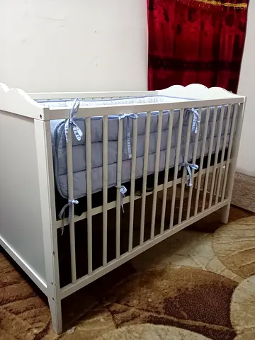 Baby cot mattress and said protector and thin mattress