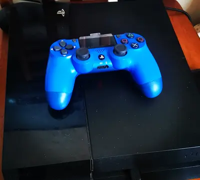 Sony PlayStation 4 with Controller and free 20 games