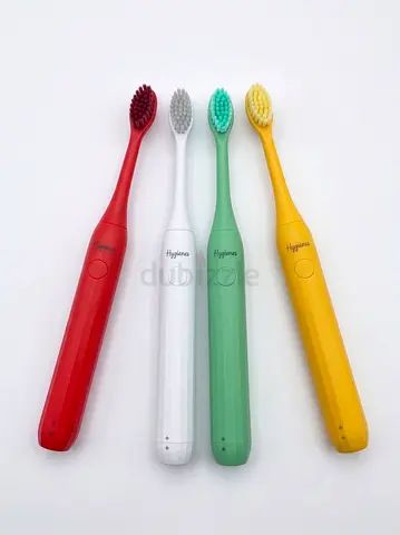 Set of 4 Colorful Electric Toothbrushes - gently used