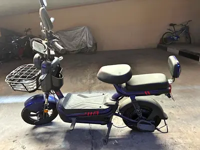 Electric two-seat city scooter / e-bike in good condition