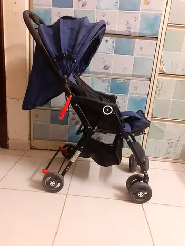 Lightweight navy compact baby stroller - used, good condition