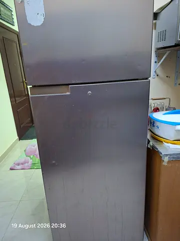 Used stainless steel refrigerator - double door, working condition