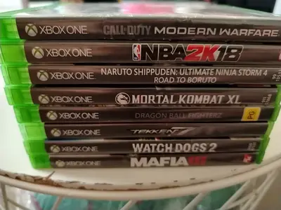 Bundle of 8 Xbox One Games — Call of Duty, Mortal Kombat, NBA2K18, Watch Dogs 2 + more