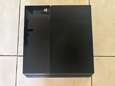 Sony PlayStation 4 (Original) console - good working condition.