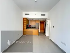Spacious 1 BR apartment - open kitchen - wardrobes - Coverd parking - family area