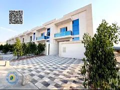 townhouse 5BR with roof , registration fees included, in Al Helio 2, Bank Financing. Freehold