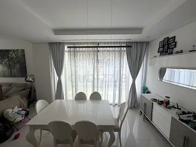 Elegant glossy white dining set for sale in excellent condition.