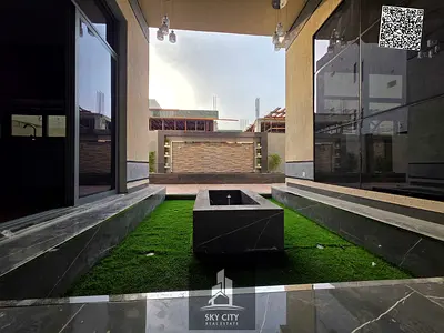 Ready to move in, with electricity and water, on Sheikh Mohammed Bin Zayed Road, 5-bedroom villa wi