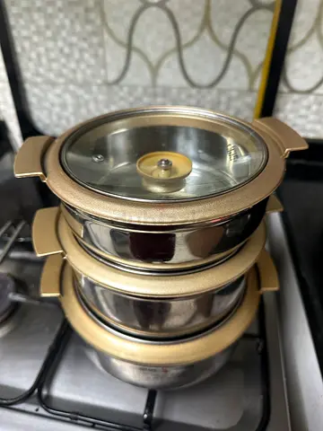 Set of 3 stainless steel pots with glass lids