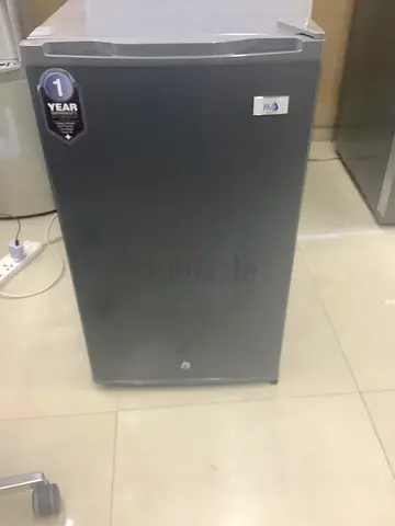 Compact single-door mini fridge - used, good condition