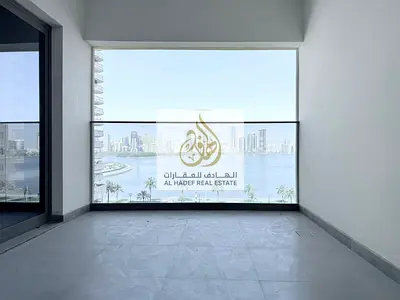 3 bedrooms and a living room with a maid's room – Brand new tower, first occupancy – Al Majaz 3 2 parking spaces + gym + swimming pool + private rooft