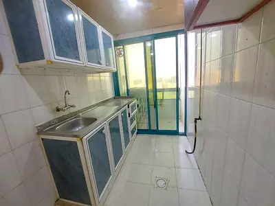 15 Days Free Family Building Good Size1 BHK Only In 28K with Balcony in 6 Payments near Al Nahda Park Al Nahda Sharjah call Azaam