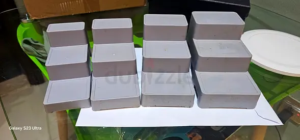 Lot of 12 Small grey Storage stand- For kitchen display